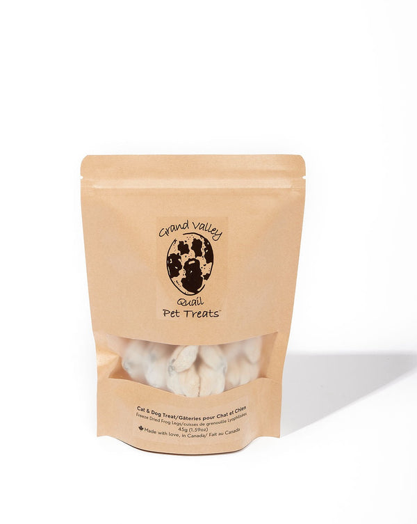 Photo - Stand-up pouch of freeze-dried frog legs dog treats. Branded packaging with visible dog treats inside. Montreal, Canada.